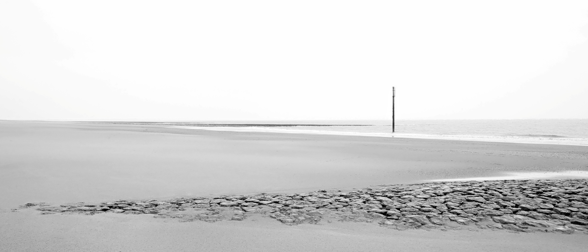 Minimalistische Strandszene